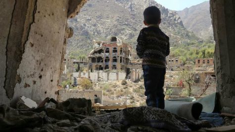 Yemeni boy gazing at rubble from his home town Taiz after a Saudi-led coalition airstrike.
Credit: Fickr (Labeled Under Creative Commons)