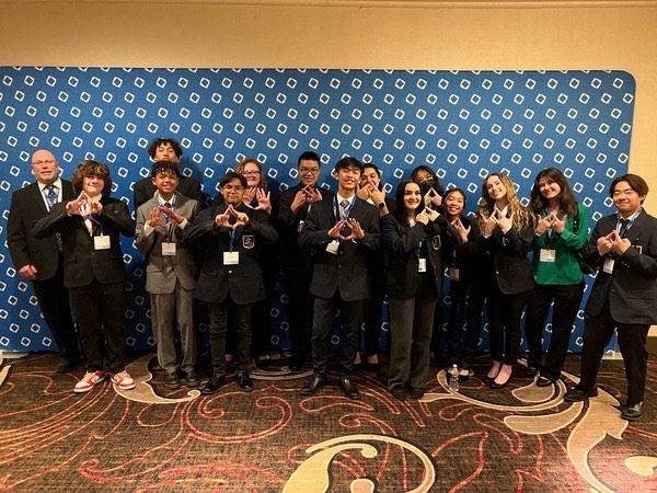 During the DECA State Career Development Conference at the Horseshoe Hotel, all the members, including their advisor Mr.Christensen was able to take a group photo before their long-awaited competitions.