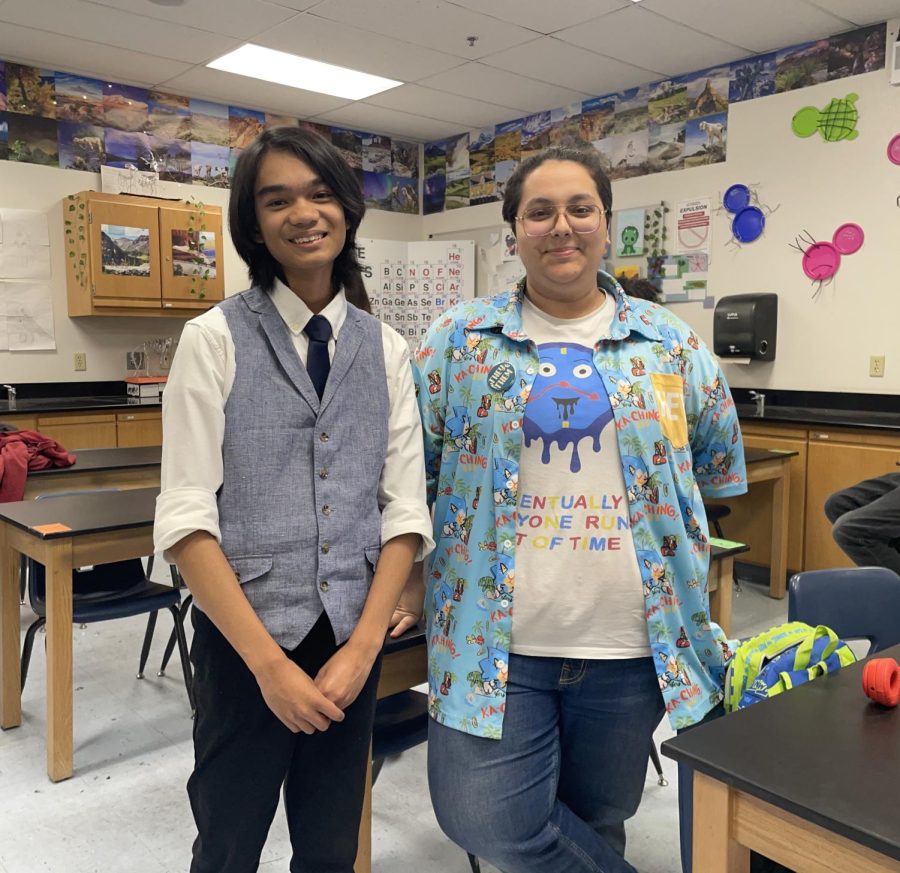 Co-presidents Javen Tinagan (he/they; left) and Arora Hernandez (they/them; right) pose in room 923 for their final Gender and Sexuality Alliance club meeting of the 2022-2023 year.
