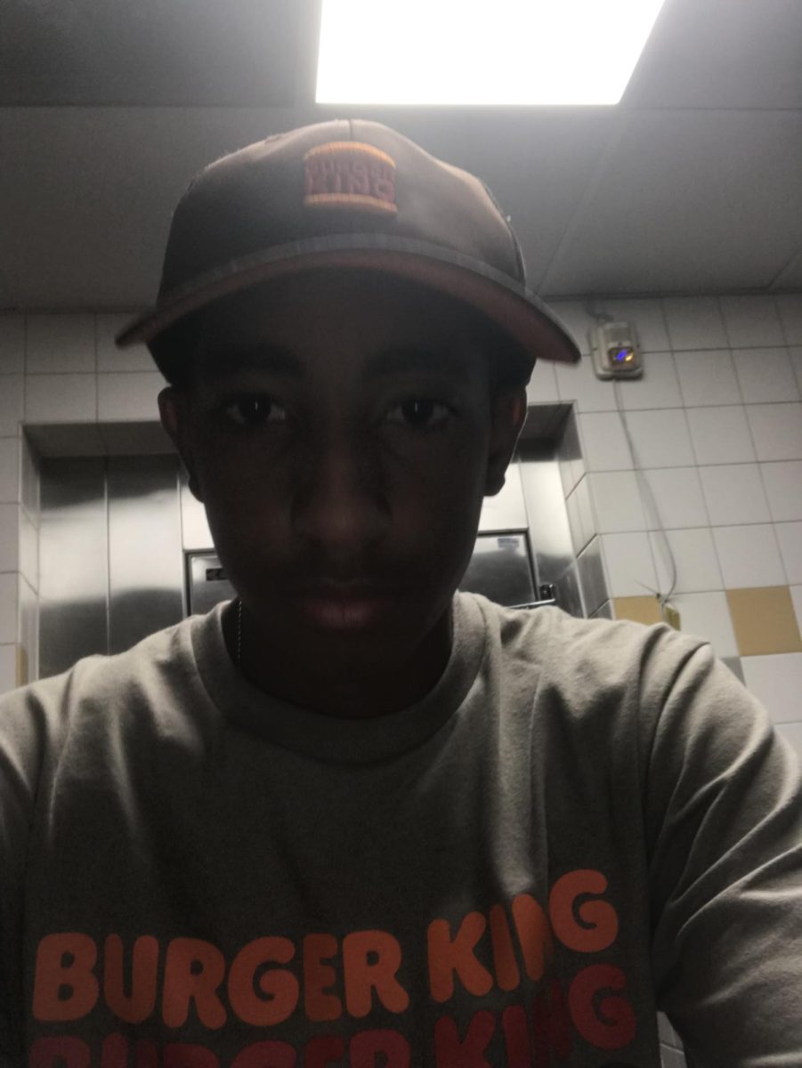 Aston Sipple Banks enjoys the free food he eats while working at Burger King.