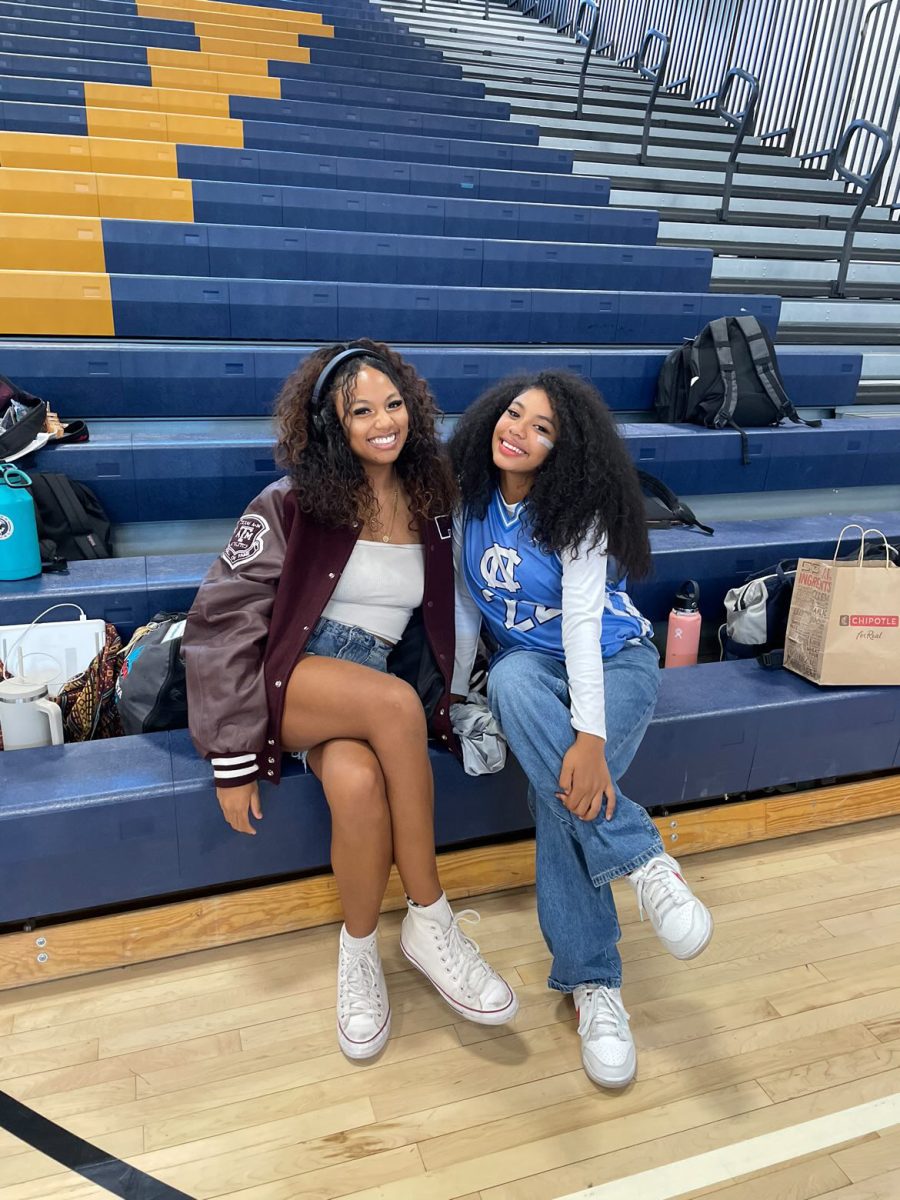 Sierra Vista High School's volleyball players Arae'yaa Love Pearson (12) and Hayhay Manibusan (9) show their school spirit on Throwback Thursday before their game where they faced off and won against Liberty High School.