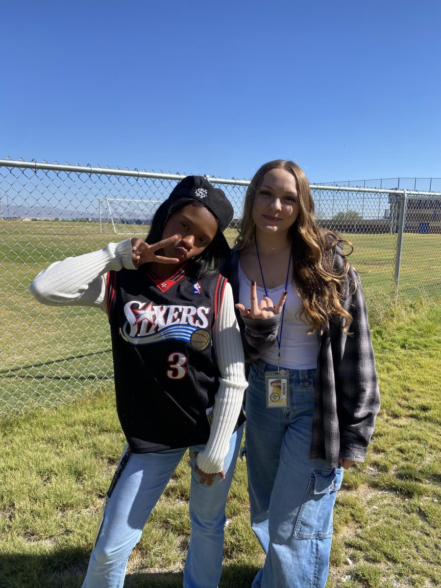 Jacqueline Bowles-Brooks(11) and Allison Stanley(11) dressed in 90s attire for Throwback Thursday.
