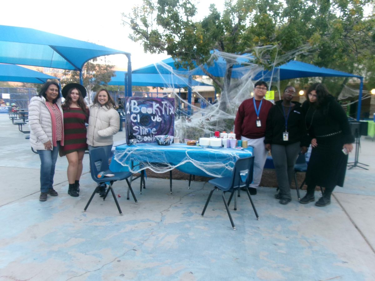 Vista's Multimedia club's face painting booth in action.