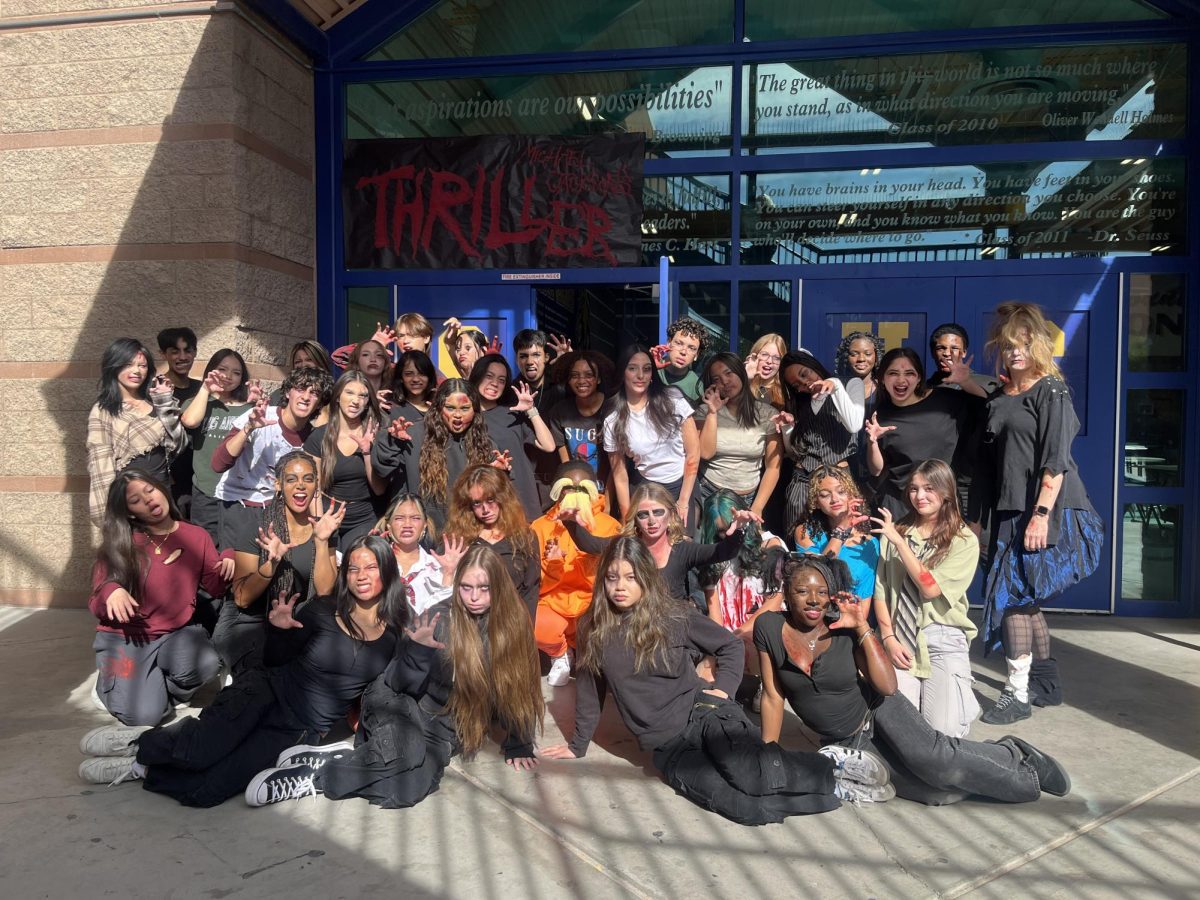 Rocking their zombie costumes, Sierra Vista High School's Synergy team show up and show out for their Halloween thriller-themed flash mob at lunch.