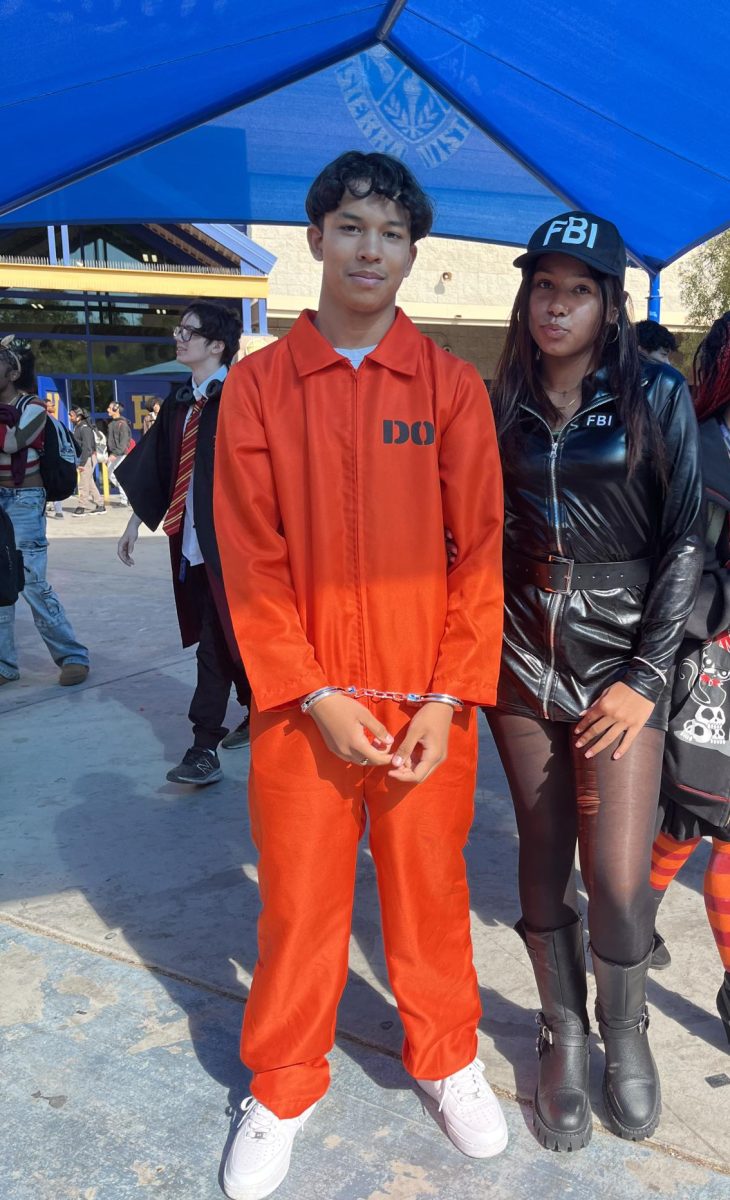 Prisoner of Love: Janaya Hainey and her boyfriend, Matias Medina at lunch in their matching costumes ready for the fun night ahead of them.