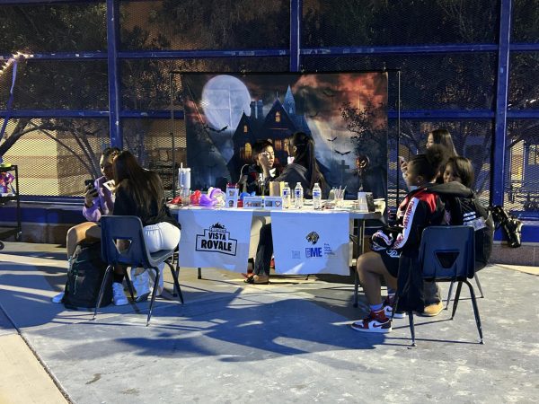 Vista's Multimedia club's face painting booth in action.