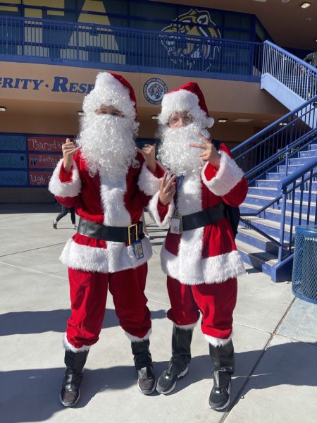 Wednesday, December 4, Alex Vegas (9) and Ashton Vega (9) dress as Santa Clause for twin day.