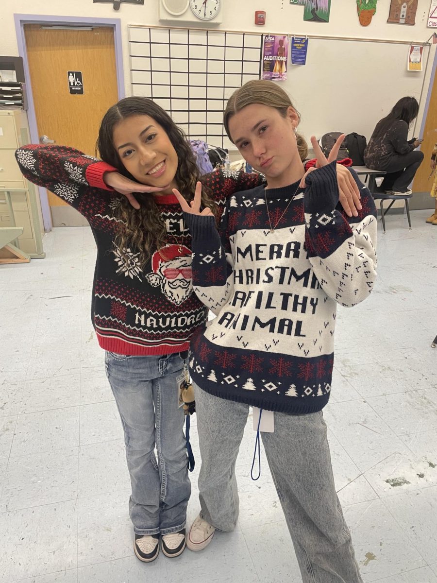 'Tis the season to rock ugly sweaters all day, every day. Thespians Jaylyn-Ena Symonds (11) and Piper Watson (09) deck the halls with their festive ugly sweaters.