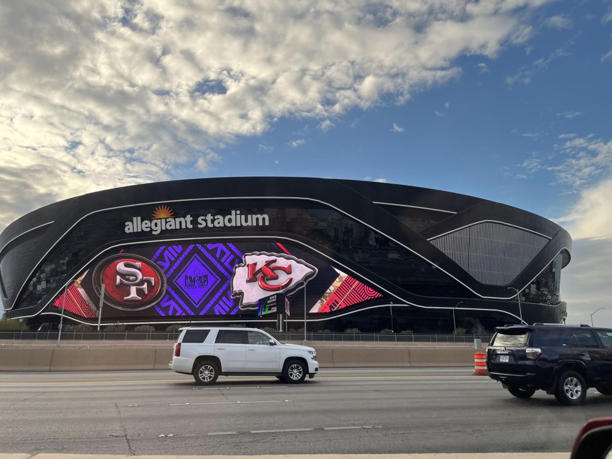 Allegiant Stadium displays the logos of the Kansas City Chiefs and the San Francisco 49ers, advertising the Super Bowl LVIII.  Wikimedia Commons