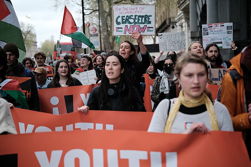 The Palestine Action and Youth demand activist group lead a march down London demanding a ceasefire in the Middle East in April of 2024. (Image sourced from Wikipedia, taken by Alisdare Hickson, originally uploaded on Flickr, licensed under Creative Commons Attribution-Share Alike 2.0 Generic license).