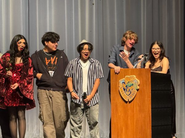 The dynamic host and hostess, Makayla Pacheco (12) and Tyler Sipes (12), announce the long-awaited winner results as the eager contestants gather on stage.
Tori Pineda (12), Jaedon Burg (12), Lee Pobre (11), Tyler Sipes (12), Makayla Pacheco (12)