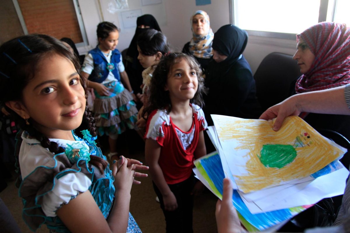 Refugee Reintegration. Syrian refugees at a clinic in Ramtha, Northern Jordan (Taken by Russell Watkins/Department for International Development for Creative Commons License).