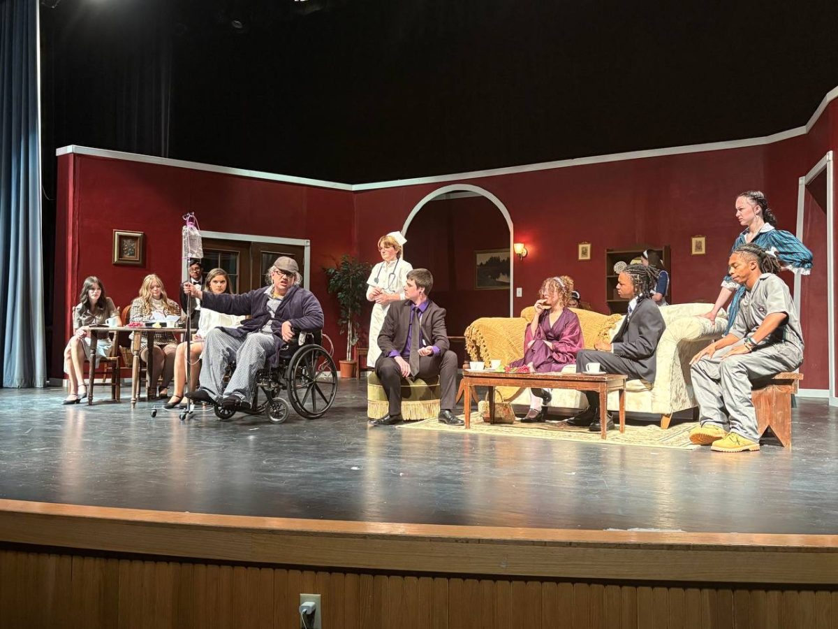 Simon Starkweather, played by Senior Gabriel Longoria (Middle), reveals his plans to clone himself, leaving his heirs little to inherit from the Starkweather fortune.