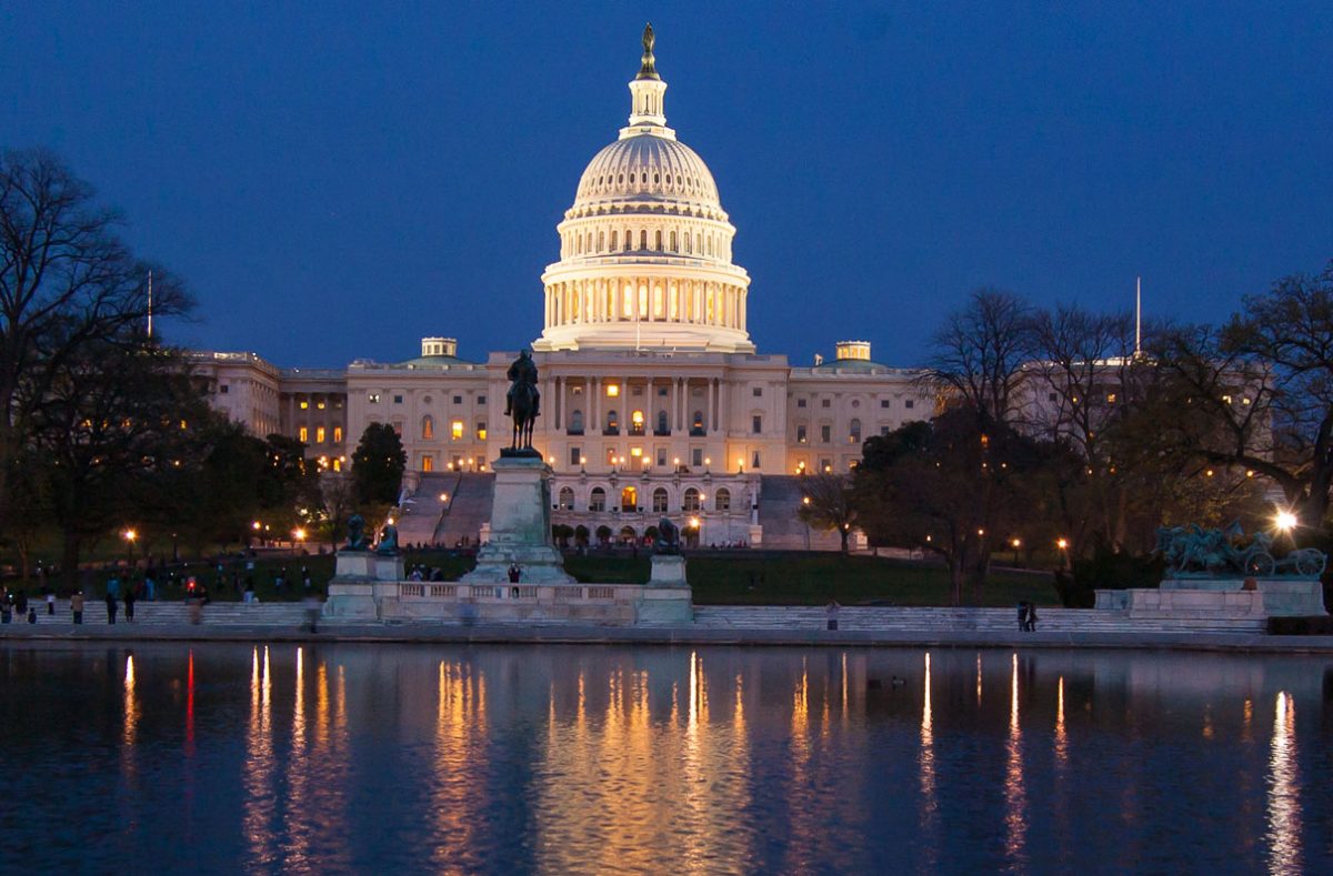 The U.S. Capitol Building on the night of November 12, 2025. After 43 days, U.S. Congress finally passed the new resolution bill that officially ended the now longest shutdown in the nation's history. (photographer unknown, sourced from The Burlingame B under Creative Commons, https://theburlingameb.org/12016/news/community-responds-to-government-shutdown-affecting-travel-and-snap/)