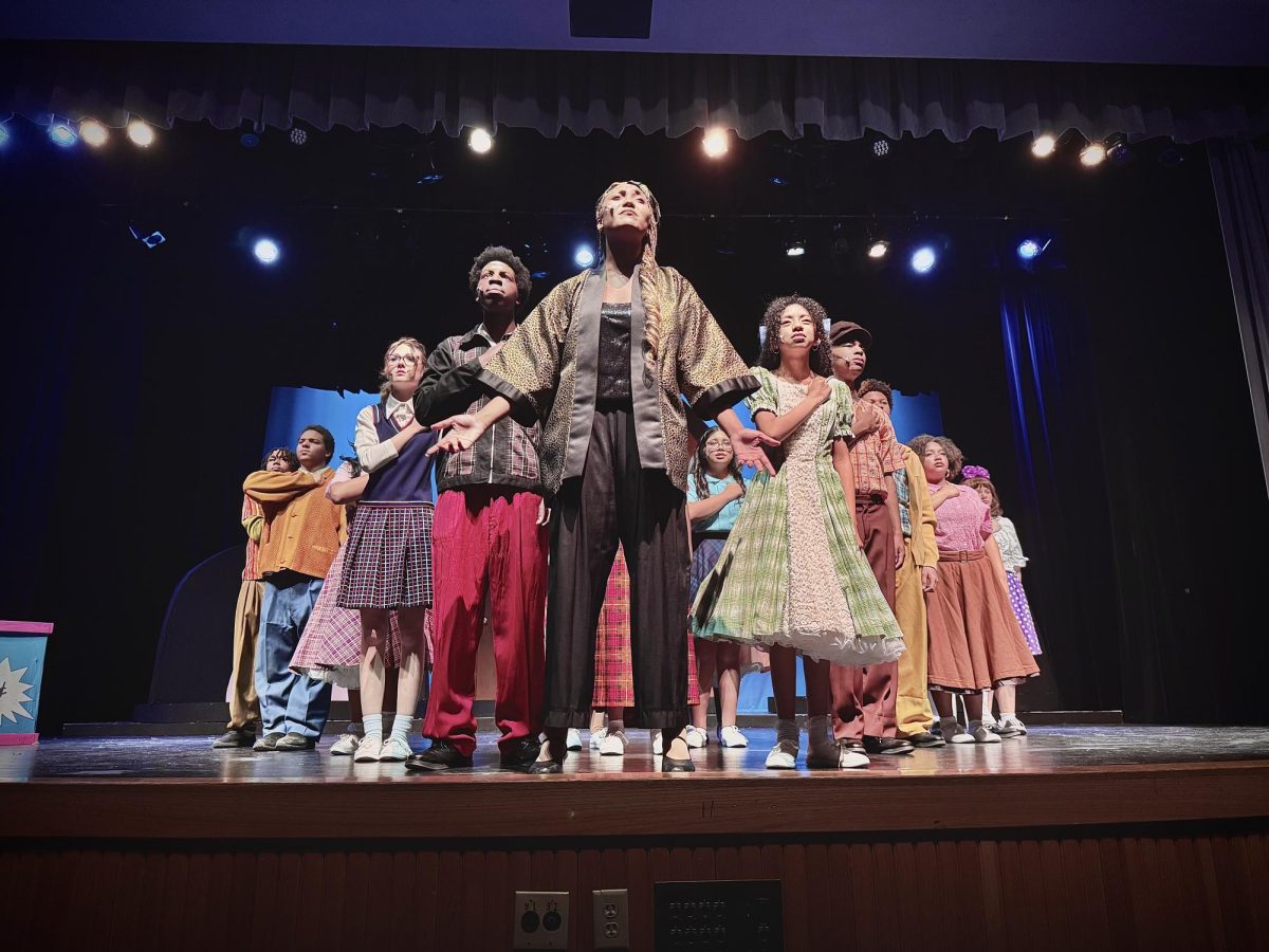 I Know Where I've Been Caption: Jaliyah Miller (12) singing the heartfelt and powerful anthem, “I Know Where I’ve Been.” Miller shares, “My favorite part about playing Motormouth Maybelle was being an activist and motivator to stand up for what’s right. I felt responsible for making the audience truly feel the joy and excitement that comes with being black, while seeing the courage needed to fight through  racism in the 60’s and now. The theatre for me is about having the unique opportunity to represent a character that people can relate to, get perspective on, or better understand. Although this is my first show, I am devastated that it’s my last in high school. I never got the chance to really be in the theatre because it always conflicted with my other activities, but when I got the chance this year I knew I had to take it. I’m so grateful that I was blessed with the opportunity to be in Hairspray and to be a part of something so special.”