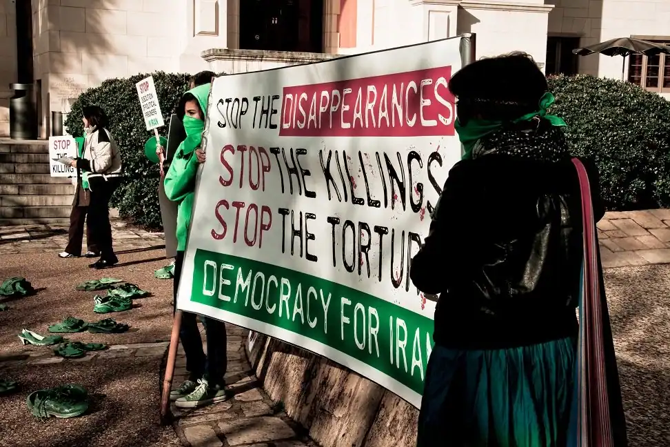 
Student protests against Iranian regime intensified in 2026. The rise in student protests reignited threats from U.S. President Donald Trump towards Iran where he vowed to prevent Iran from attaining nuclear power. (image sourced from Socialist Worker, originally uploaded to Flickr by Christopher Rose under CC by-NC-SA 3.0, https://socialistworker.co.uk/international/students-in-iran-reignite-anti-regime-protests/)