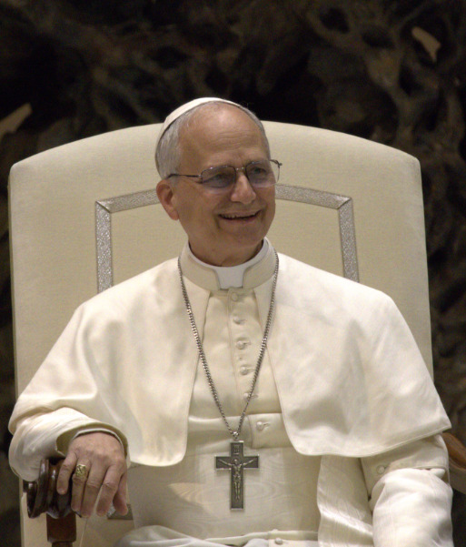 Pope Leo XVI smiles at his fellow Catholic Church members after becoming the 267th Pope. Photo Credits: Wikimedia Commons