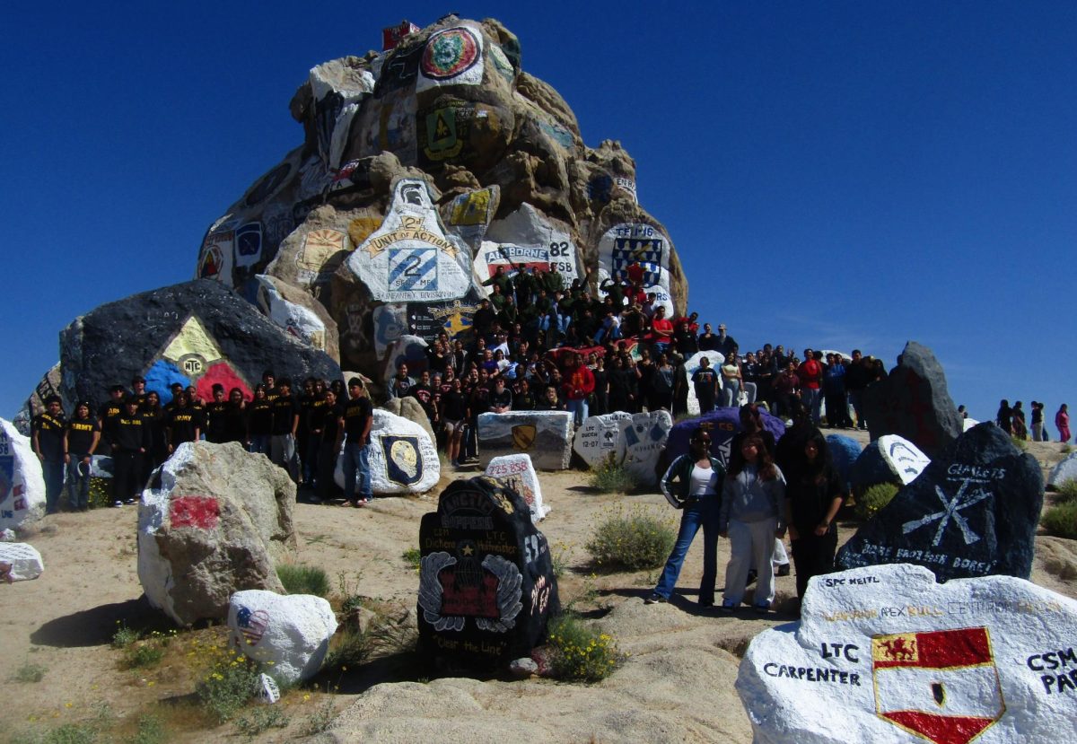 Cadets from Las Vegas gather in front of the Painted Rocks memorial. 
