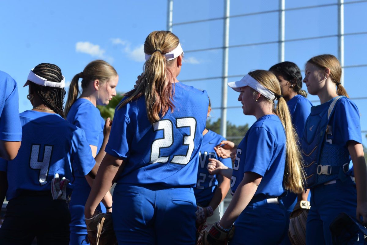 Sierra Vista’s varsity softball team huddles up, building energy and communication as they prepare for the next inning.