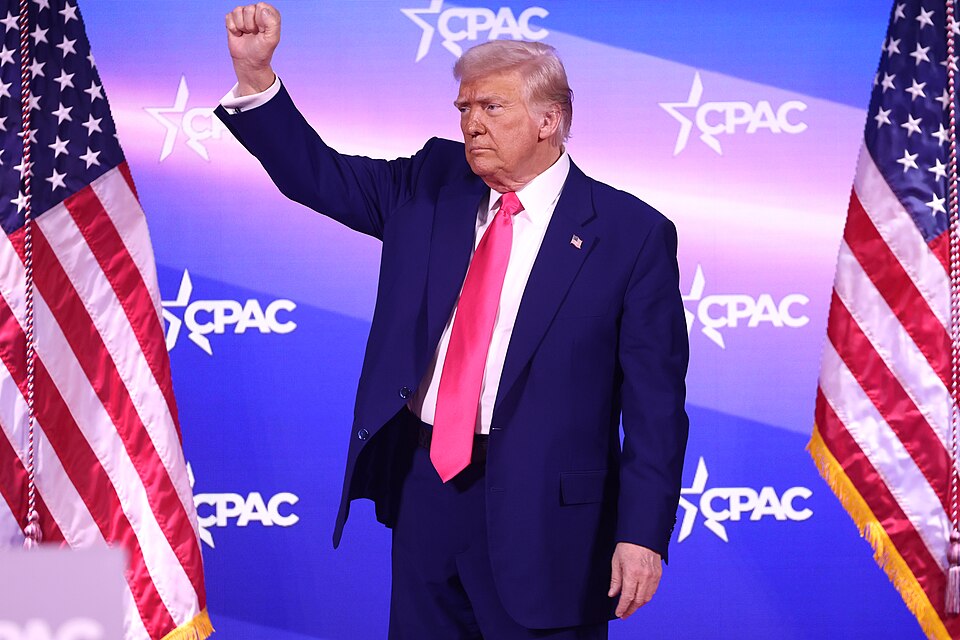 President Trump one month into his term attends the Conservative Political Action Conference in National Harbor, Maryland. (photo sourced from Wikipedia, attribution to Gage Skidmore and licensed under CC-by-SA 2.0, https://commons.wikimedia.org/wiki/File:Donald_Trump_%2854362202311%29.jpg)