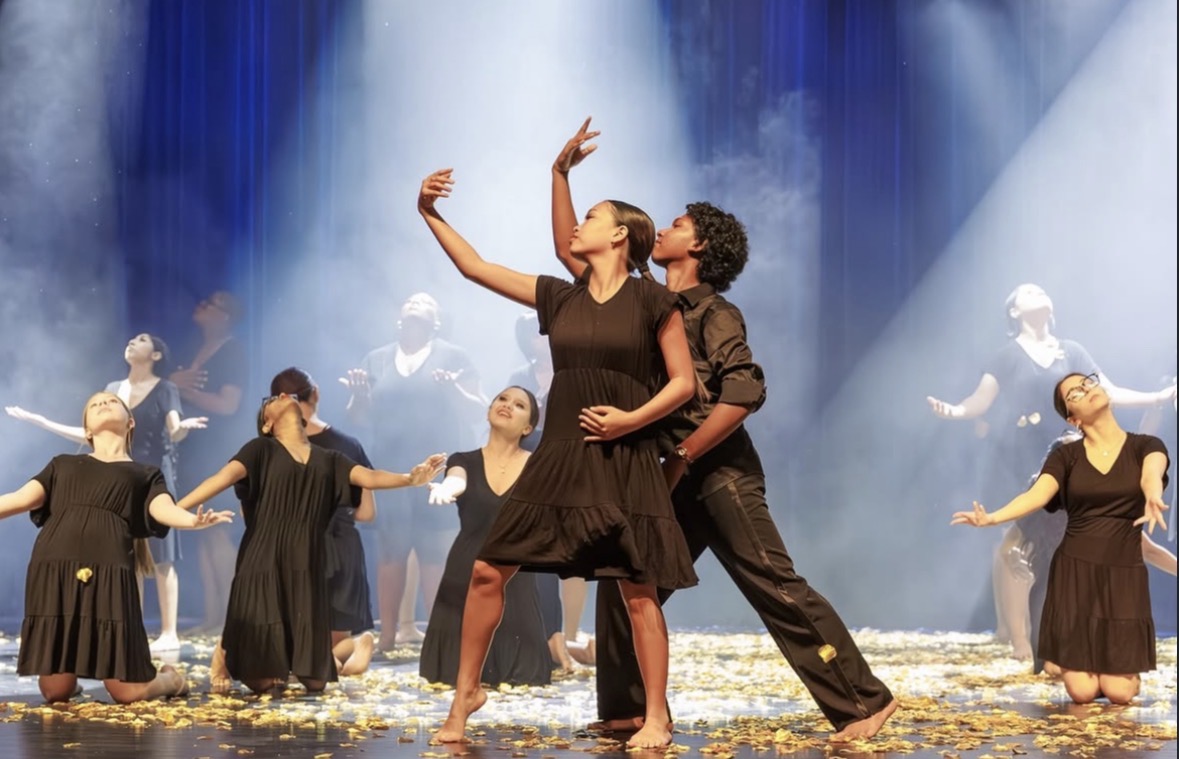 Dancers Jumar McClain (10) and Audrey Marthepharack (9) shock the crowd as they perform their lead parts in Ms. Jessica Sneek’s fourth period dance entitled “Fields Of Gold”.
