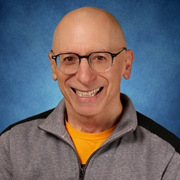 Mr Clayman says farewell in his final staff photograph.